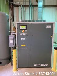 Used Atlas Copco Oil-Free Scroll Air Compressor, Model SF-11. 40.3 cfm; 113 psi max pressure. Driven by a 3505 RPM, 15 HP motor. Built 2005. 31,856 hours. Includes 240 gallon air receiver tank.